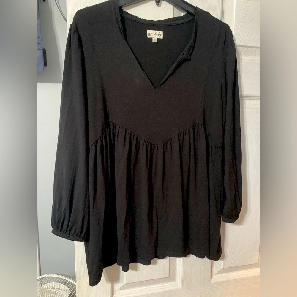 Dressy blouse. Comfortable and hides the tummy.